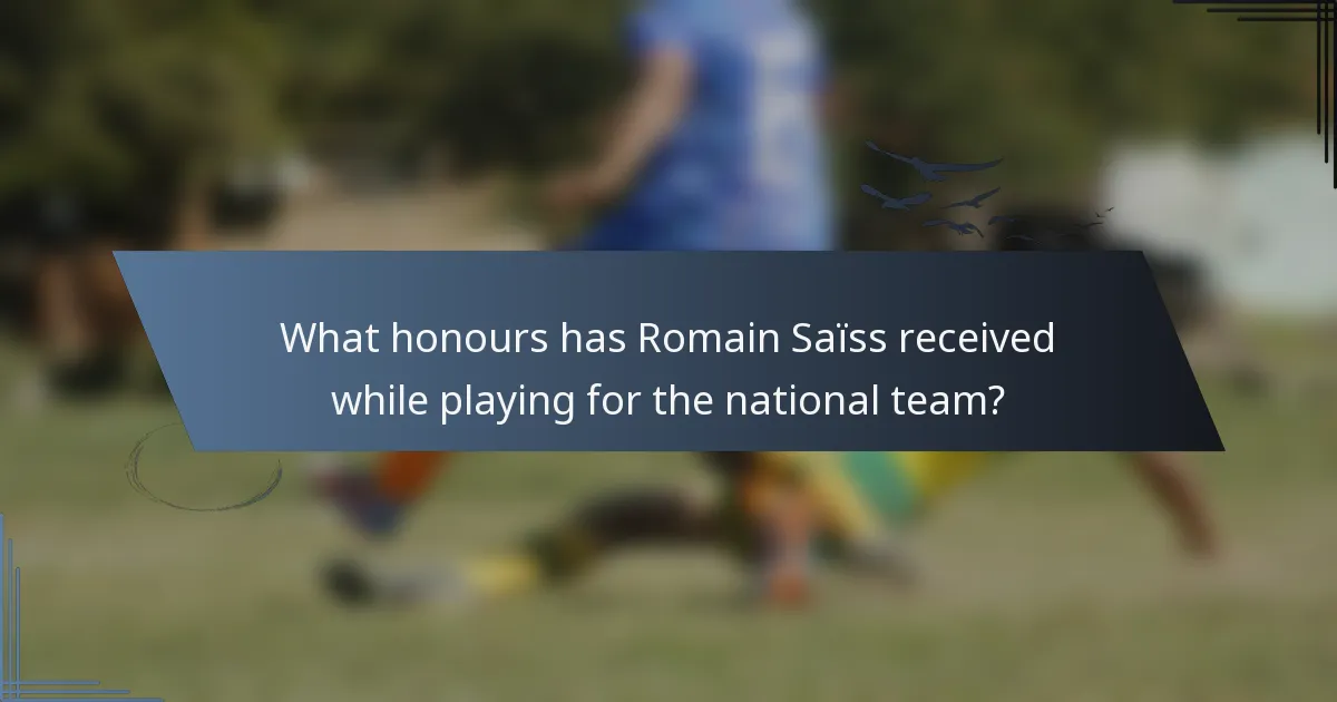 What honours has Romain Saïss received while playing for the national team?